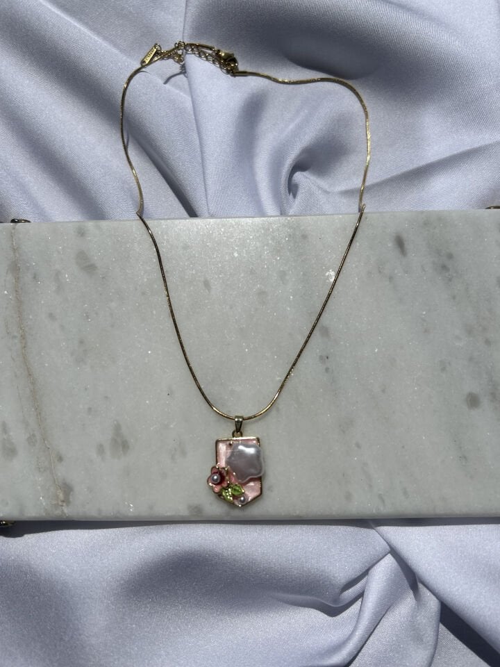 Gold Art Necklace with Pink Details